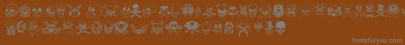 OnlySkulls-Schriftart – Graue Schriften auf braunem Hintergrund