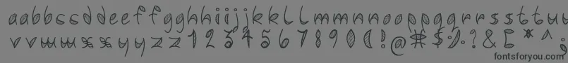 フォントLeafyfont – 黒い文字の灰色の背景