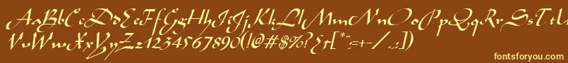 AladdinItalic-fontti – keltaiset fontit ruskealla taustalla