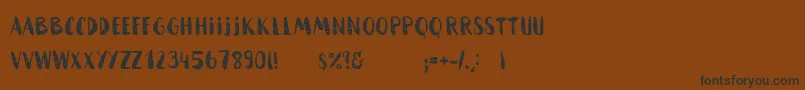 HammockRoughHome-Schriftart – Schwarze Schriften auf braunem Hintergrund
