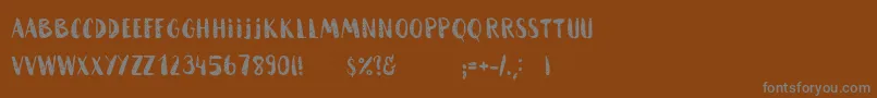 Шрифт HammockRoughHome – серые шрифты на коричневом фоне