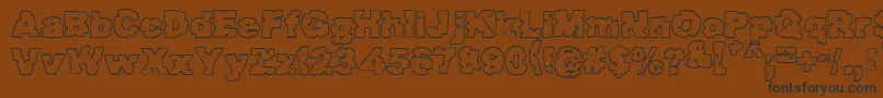 Raptor ffy Font – Black Fonts on Brown Background