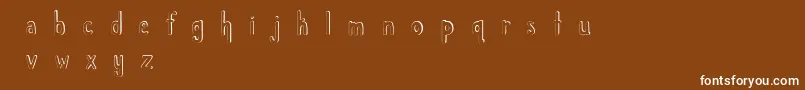 Шрифт ChildlikeWonder – белые шрифты на коричневом фоне