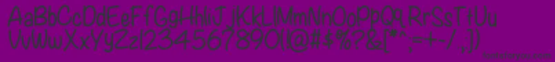 Kbwritersblock-fontti – mustat fontit violetilla taustalla