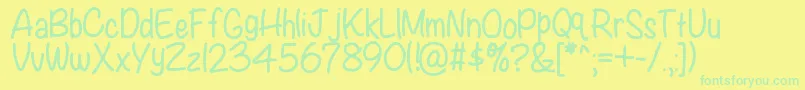 Kbwritersblock-Schriftart – Grüne Schriften auf gelbem Hintergrund