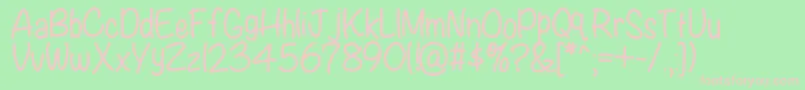 Fonte Kbwritersblock – fontes rosa em um fundo verde