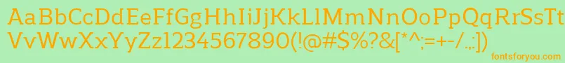 フォントReganslabMedium – オレンジの文字が緑の背景にあります。