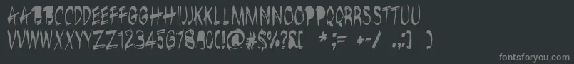 フォントBrushshopRegular – 黒い背景に灰色の文字