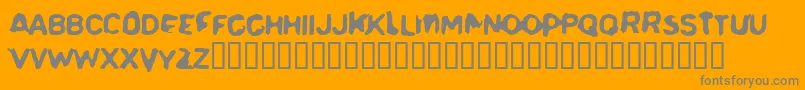 Delerium-Schriftart – Graue Schriften auf orangefarbenem Hintergrund