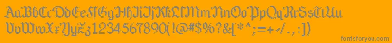 Teutonia-Schriftart – Graue Schriften auf orangefarbenem Hintergrund