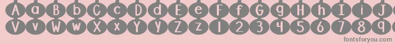 Więcej informacji o czcionce DjbLinusPumpkin Czcionka DjbLinusPumpkin – szare czcionki na różowym tle
