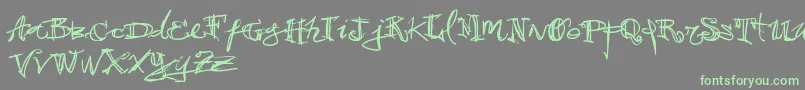 Vtks38 Font – Green Fonts on Gray Background