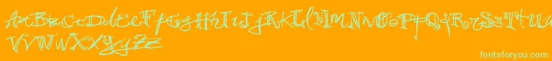 Vtks38-Schriftart – Grüne Schriften auf orangefarbenem Hintergrund