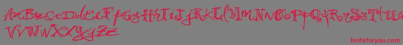 フォントVtks38 – 赤い文字の灰色の背景