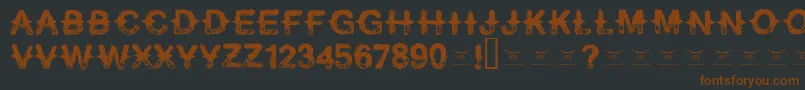 Neverspeakof-fontti – ruskeat fontit mustalla taustalla