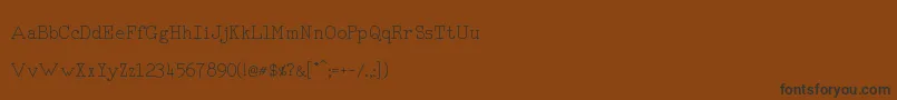 フォントRmTyperighter – 黒い文字が茶色の背景にあります