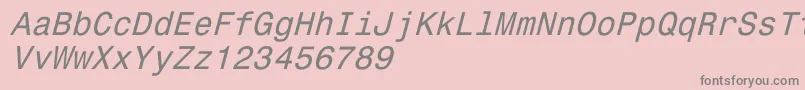 Fonte Monospace821Italic – fontes cinzas em um fundo rosa