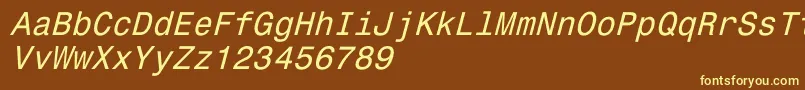 Czcionka Monospace821Italic – żółte czcionki na brązowym tle