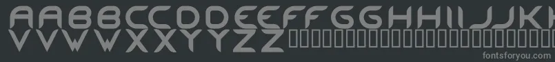 MaestroRegular-fontti – harmaat kirjasimet mustalla taustalla