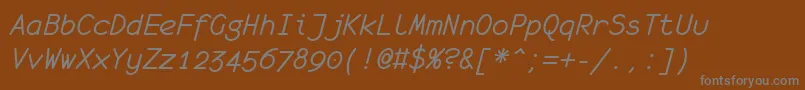 Czcionka MonofurItalic – szare czcionki na brązowym tle