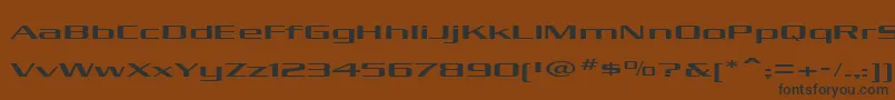 フォントKubraMedium – 黒い文字が茶色の背景にあります