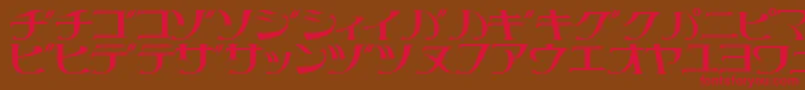 フォントLittrg – 赤い文字が茶色の背景にあります。