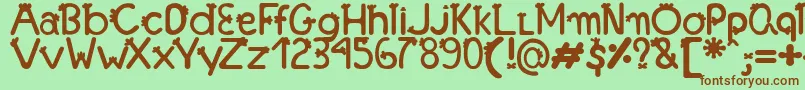 フォントFonteFranjinhaAntoniaFagnia – 緑の背景に茶色のフォント