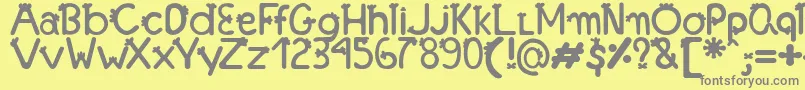 FonteFranjinhaAntoniaFagnia-fontti – harmaat kirjasimet keltaisella taustalla