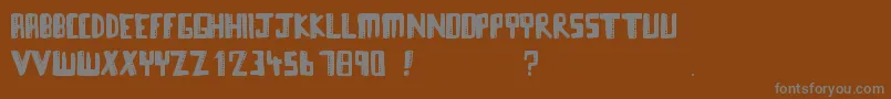 フォントTowerblocks – 茶色の背景に灰色の文字