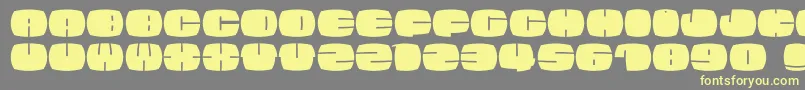 Elefontissimo-Schriftart – Gelbe Schriften auf grauem Hintergrund
