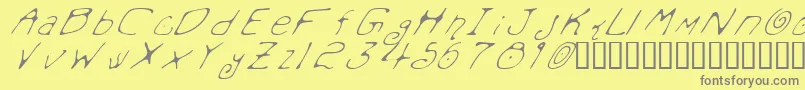 フォントMondoMessoFontoItalic – 黄色の背景に灰色の文字