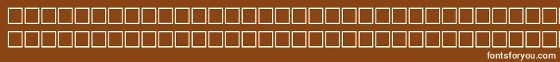 フォントQuiditalRegular – 茶色の背景に白い文字