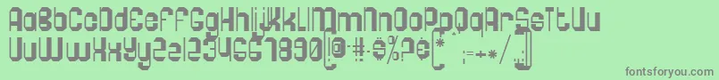 フォントPogo ffy – 緑の背景に灰色の文字