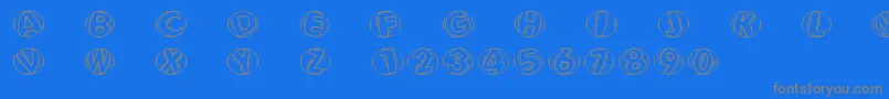 Woodcuttedcapsfs Font – Gray Fonts on Blue Background