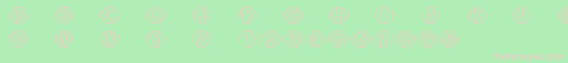 Woodcuttedcapsfs Font – Pink Fonts on Green Background