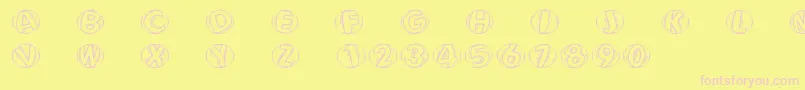 Fonte Woodcuttedcapsfs – fontes rosa em um fundo amarelo