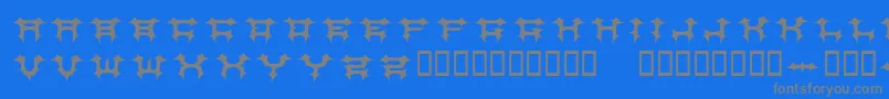 Fonte CosmicbatsV1 – fontes cinzas em um fundo azul
