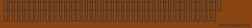 Czcionka Uzgeopunkt – czarne czcionki na brązowym tle