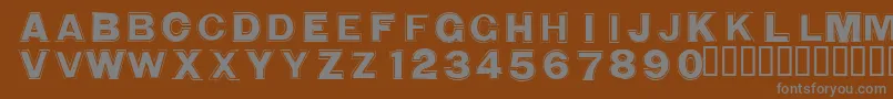 WashingmachineCloser-fontti – harmaat kirjasimet ruskealla taustalla