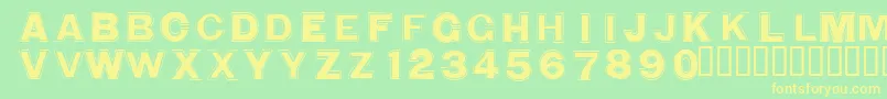 WashingmachineCloser-fontti – keltaiset fontit vihreällä taustalla