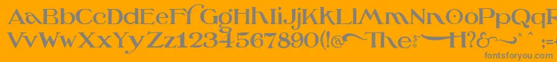 OzswizardTinwoodman-Schriftart – Graue Schriften auf orangefarbenem Hintergrund