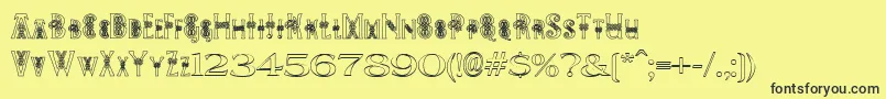 PeesCelticOutline Font – Black Fonts on Yellow Background