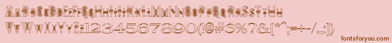 PeesCelticOutline-Schriftart – Braune Schriften auf rosa Hintergrund