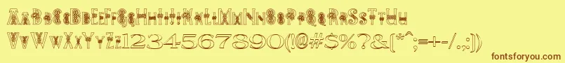 PeesCelticOutline Font – Brown Fonts on Yellow Background