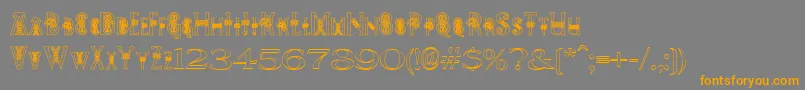 PeesCelticOutline Font – Orange Fonts on Gray Background