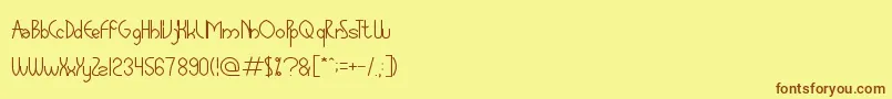 GlobalCapitalism Font – Brown Fonts on Yellow Background
