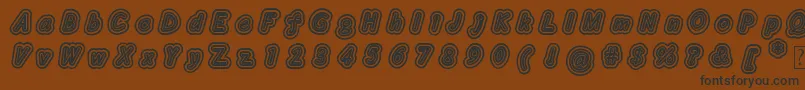 Layeradri Font – Black Fonts on Brown Background