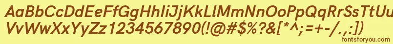 フォントHkgroteskBolditalic – 茶色の文字が黄色の背景にあります。