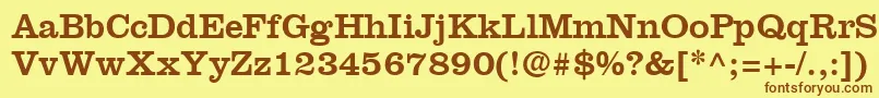 フォントIntroitSsi – 茶色の文字が黄色の背景にあります。