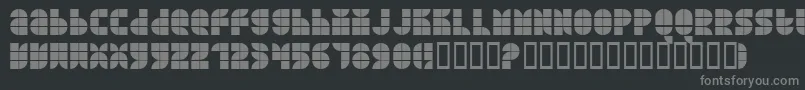 QuarterroundTile-fontti – harmaat kirjasimet mustalla taustalla